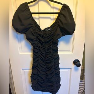 Lulus black ruched dress size small. Worn once to cocktail party.